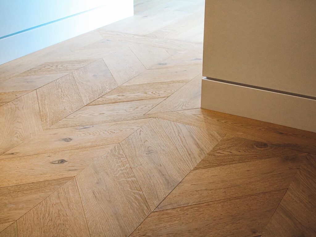 Beautiful eco-friendly hardwood flooring in a modern Squamish home, showcasing durability and style