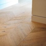 Beautiful eco-friendly hardwood flooring in a modern Squamish home, showcasing durability and style
