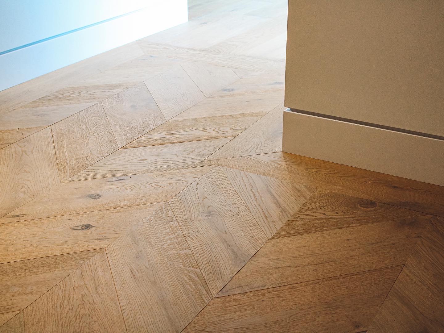 Beautiful eco-friendly hardwood flooring in a modern Squamish home, showcasing durability and style