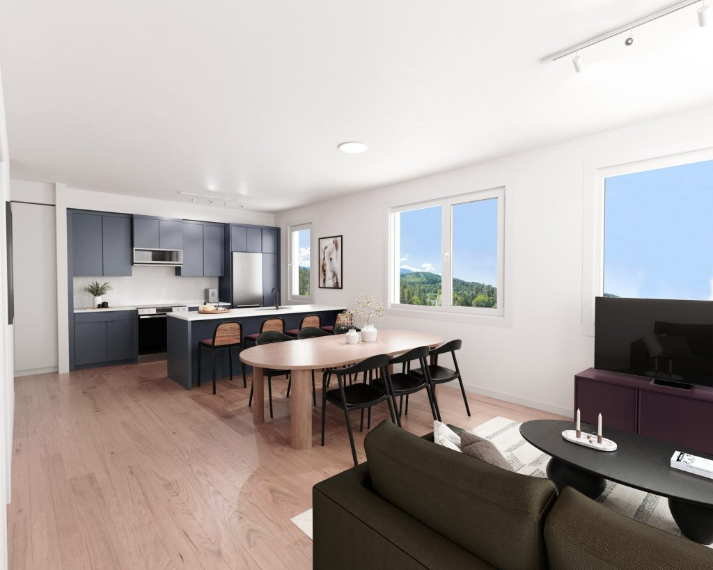 Open living space with darker-toned engineered hardwood flooring in a Squamish show home — Tantalus Floors