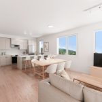 The Alexander 3 Open-plan living, dining, and kitchen with light engineered hardwood flooring and mountain views in a Squamish show home — Tantalus Floors